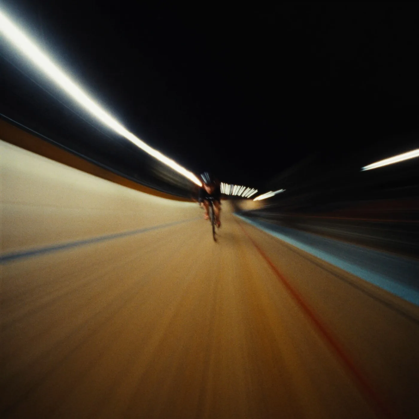 Runner in a motion-blurred tunnel